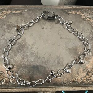 Elegant Stainless Anklet with antiqued silver bells-and intricate clasp.